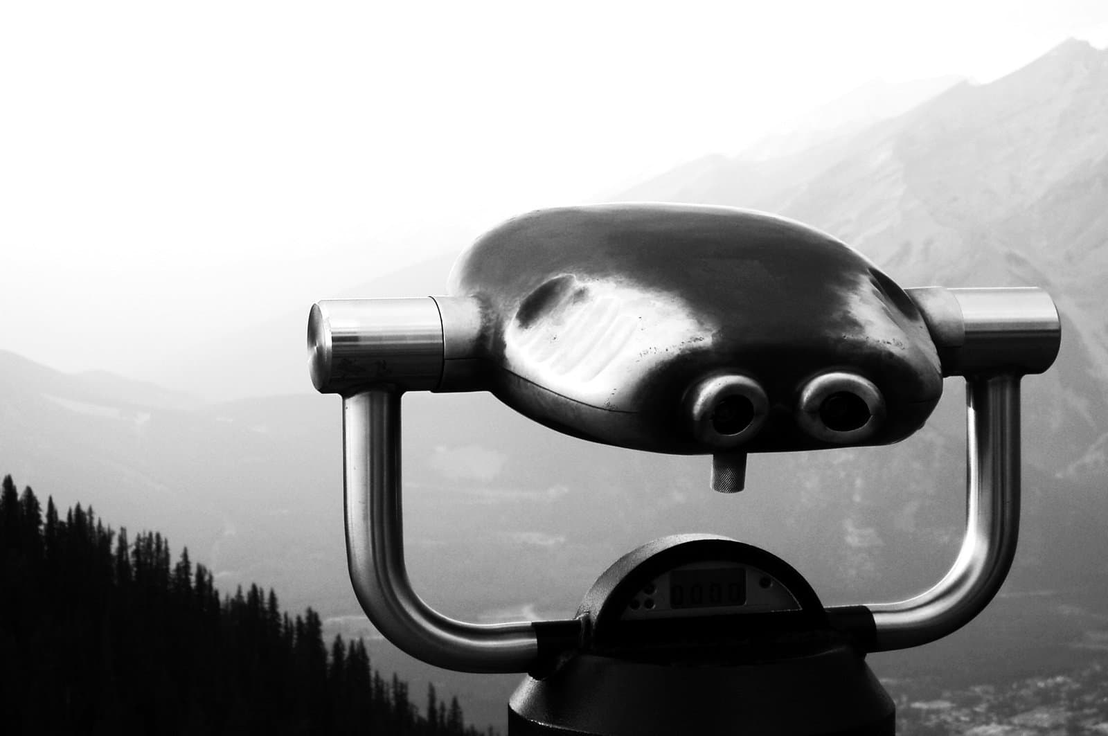 Binoculars (coin operated) at a scenic viewpoint in the mountains.